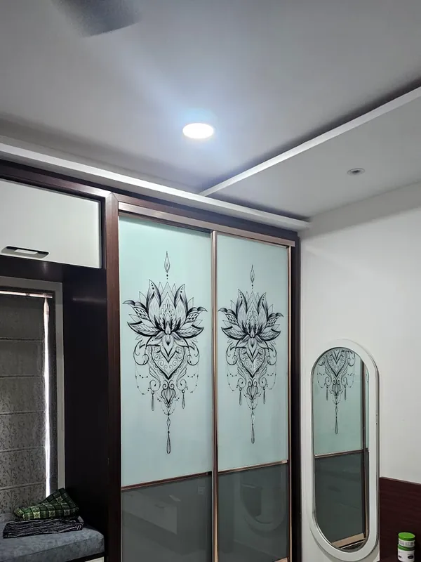 Lotus-etched glass on a sliding wardrobe.