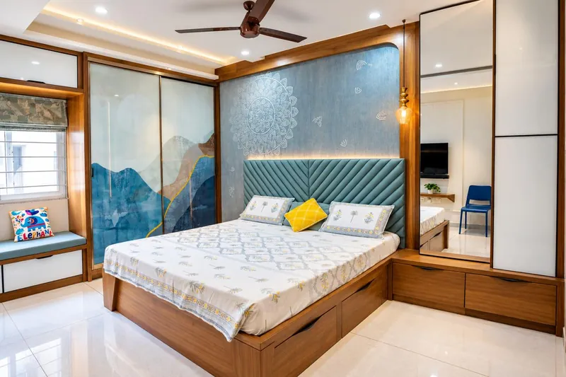 A painted mountain wardrobe and a mandala wall.